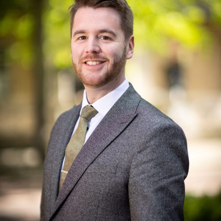 Ruairi McLaughlin in a brown suit