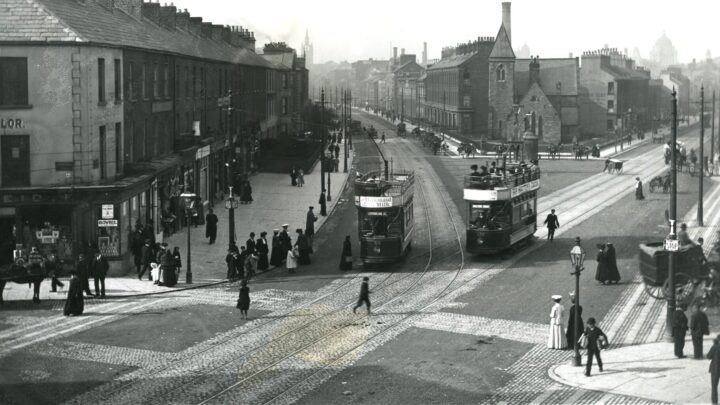 Standard Reds 52 and 121 heading to Corporation Street and Malone Road respectively. The scene is Shaftesbury Square and the date is about 1906 - the tracks have not yet been laid in Botanic Avenue. The church-like building in the centre is the Magdelene School House, demolished in 1930 and replaced by the Ulster Bank and later an office block. For many years in the 1960s and 1970s a pair of nude sculpture was attached to the wall and caused quite a controversy in conservative Belfast at the time!