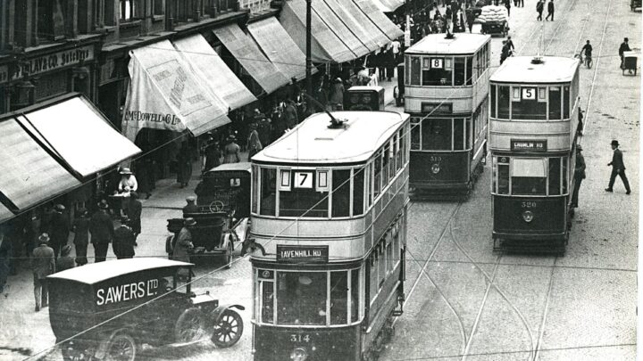 In 1920 the then General Manager Moffett ordered 50 new enclosed cars which took his name, 314, 319, and 320 were photographed in High Street in the early 1920s. Note the route number blinds carried black numerals on a white background - reversed shortly afterwards. The track leading into Bridge Street can just be seen behind No 320. Before the Second World War, Bridge Street was very narrow - until the German Luftwaffe helped convert it to a dual carriageway! [credit: W. Camwell]