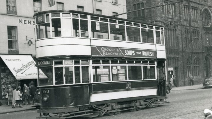For a few months in 1953-4 Ligoniel trams reversed in Wellington Place over a newly constructed cross-over. This was considered to be safer for passengers than the busier Donegall Square North. The trolley has been swung and is on the other side of the road. [credit: Roy Brook]