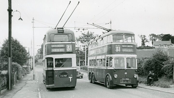 AECs 32 and 29 near Castlereagh terminus in the early 1940s. For a while trolleybuses turned in the mouth of the Castlereagh Road / Knock Road / Ballygowan Road. This quiet rural cross roads is a major four lane junction now. [credit: W.J. Wyse]