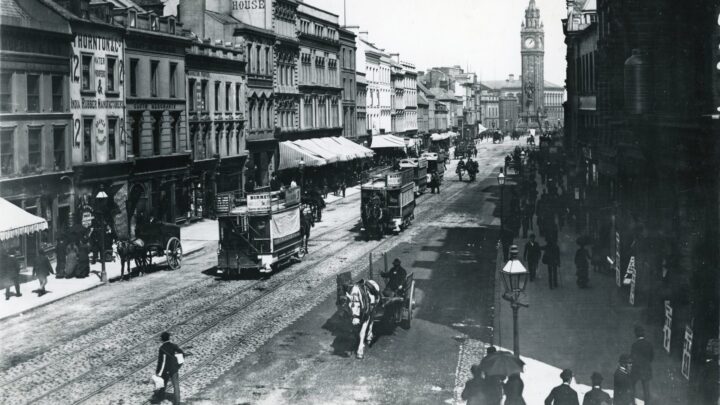 A mixture of double deck and single deck trams in High Street. No 7 is headed to Richmond or Fortwilliam Park. In those days Richmond Park was on the Antrim Road near to its junction with Cavehill Road. Note the spindly iron steps to the upper deck and the sunshade shielding the side windows [credit: National Library of Ireland]